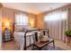 Comfortable bedroom with a bed, a dresser, and plenty of natural light at 509 W Pierson St, Greenfield, IN 46140