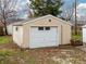 Detached garage with a roll up door at 509 W Pierson St, Greenfield, IN 46140