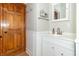 Bathroom with elegant vanity, white trim, and stylish fixtures at 6045 N 300 W, Greenfield, IN 46140