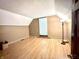 Cozy bedroom featuring hardwood floors, neutral paint, and a window at 6045 N 300 W, Greenfield, IN 46140