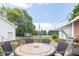 Outdoor wooden deck featuring a dining table, grill, and potted flowers, offering a perfect spot for relaxation at 6045 N 300 W, Greenfield, IN 46140