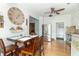 Charming dining space featuring a wood table, view to kitchen, and natural light at 6045 N 300 W, Greenfield, IN 46140