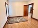 Elegant living room with a decorative rug, hardwood floors, and natural light at 6045 N 300 W, Greenfield, IN 46140