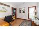 Office space with wooden desk, natural light, and traditional trim at 6045 N 300 W, Greenfield, IN 46140
