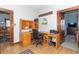 Spacious office with custom built-ins, hardwood floors, and natural light at 6045 N 300 W, Greenfield, IN 46140