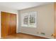 Bedroom with wood floors, closet, and natural light at 625 Mulberry St, Zionsville, IN 46077