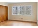 Bedroom with wood floors and large window at 625 Mulberry St, Zionsville, IN 46077