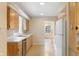 Functional kitchen with light wood cabinets and stainless steel dishwasher at 625 Mulberry St, Zionsville, IN 46077