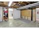 Unfinished basement with concrete floor, exposed ceiling, and potential for customization at 6537 Grosvenor Pl, Indianapolis, IN 46220