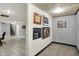 Finished basement with tiled floors, art on the wall, and an open floor plan at 6537 Grosvenor Pl, Indianapolis, IN 46220