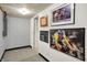 Basement with tile flooring, art, and easy access to other rooms at 6537 Grosvenor Pl, Indianapolis, IN 46220