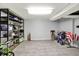 Spacious unfinished basement with shelving and ample storage options at 6537 Grosvenor Pl, Indianapolis, IN 46220