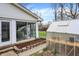 Sunroom features a greenhouse, a garden bed, and lots of natural light at 6537 Grosvenor Pl, Indianapolis, IN 46220