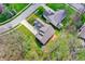 Drone view of two houses featuring well-maintained lawns, driveways and some landscaping at 7562 Black Walnut Dr, Avon, IN 46123