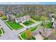 Bird's eye view of homes in a wooded neighborhood showcasing landscaping and quiet streets at 7562 Black Walnut Dr, Avon, IN 46123