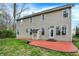 Two story home with a large red-stained concrete patio and lawn at 7562 Black Walnut Dr, Avon, IN 46123