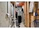 Unfinished basement area with exposed pipes, water filtration, and utilities at 7562 Black Walnut Dr, Avon, IN 46123