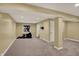 Basement featuring an exercise bike and carpet flooring at 7562 Black Walnut Dr, Avon, IN 46123