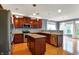 Well-appointed kitchen with stainless appliances, ample counter space, cherry cabinets and hardwood flooring for charm at 7562 Black Walnut Dr, Avon, IN 46123