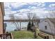 This backyard offers lovely waterfront views and great spaces for entertaining at 7653 River Rd, Indianapolis, IN 46240