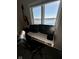 This dedicated workspace has a scenic water view and natural light at 7653 River Rd, Indianapolis, IN 46240