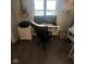 This work from home space has a desk and computer set up with a waterfront view at 7653 River Rd, Indianapolis, IN 46240