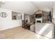 Inviting living room featuring an open layout, fireplace, and access to an adjacent kitchen area at 7653 River Rd, Indianapolis, IN 46240