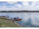 Waterfront views with boat docks and boat access at 7653 River Rd, Indianapolis, IN 46240