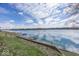Enjoy scenic water views from this beautifully landscaped lawn at 7653 River Rd, Indianapolis, IN 46240