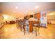 Finished basement includes a bar area with barstool seating and a dining table at 7732 Ashtree Dr, Indianapolis, IN 46259