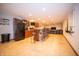 Finished basement with a bar, seating, and plenty of space for entertaining guests at 7732 Ashtree Dr, Indianapolis, IN 46259