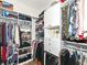 Walk-in closet with custom shelving, ample storage space for clothes, shoes and accessories at 811 Harley Ln, Westfield, IN 46074