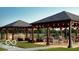 Community outdoor gazebo with a built-in grill and seating areas for residents at 811 Harley Ln, Westfield, IN 46074