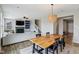 Bright living space showcasing a seamless transition from the living room to the dining area at 8818 Tributary Dr, Indianapolis, IN 46259