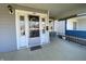 Inviting front porch with a swing, decorative door with glass, and room to relax at 925 E Main St, Muncie, IN 47305