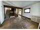 Spacious living room with hardwood floors, natural woodwork, and a classic design at 925 E Main St, Muncie, IN 47305