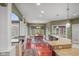 Bright dining area with large windows and elegant chandelier lighting at 999 Box Turtle Ct, Columbus, IN 47201