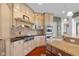 A kitchen with granite countertops, tile backsplash, stainless appliances, and lots of cabinet space at 999 Box Turtle Ct, Columbus, IN 47201
