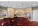Kitchen with stainless steel appliances, granite countertops, and custom cabinetry at 999 Box Turtle Ct, Columbus, IN 47201