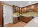 Updated kitchen featuring wooden cabinets, modern appliances, and sleek countertops at 999 Box Turtle Ct, Columbus, IN 47201