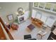 Overhead shot of living room with fireplace, seating, and natural light at 999 Box Turtle Ct, Columbus, IN 47201