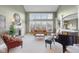 Spacious living room featuring high ceilings, ample natural light, and cozy seating area at 999 Box Turtle Ct, Columbus, IN 47201