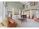 Open-concept living room with views into the kitchen and dining area at 999 Box Turtle Ct, Columbus, IN 47201