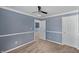 Bedroom featuring neutral walls, plush carpeting, a ceiling fan, and standard closet at 10432 Dark Star Dr, Indianapolis, IN 46234