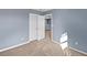 Bedroom features neutral walls, plush carpeting, and standard double door closet at 10432 Dark Star Dr, Indianapolis, IN 46234
