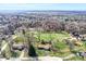 Expansive aerial view of property featuring large lawn, mature trees, and neighborhood views at 110 Jordan Ct, Martinsville, IN 46151
