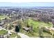 Scenic aerial of property showcases its location amidst mature trees and neighborhood, promising privacy at 110 Jordan Ct, Martinsville, IN 46151