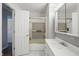 Bathroom featuring a shower with sliding glass doors and updated lighting at 110 Jordan Ct, Martinsville, IN 46151