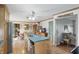 Open-concept kitchen featuring a center island, wood cabinetry, and view of adjacent spaces at 110 Jordan Ct, Martinsville, IN 46151