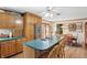 Spacious kitchen with wood cabinets, modern appliances, and a functional center island at 110 Jordan Ct, Martinsville, IN 46151